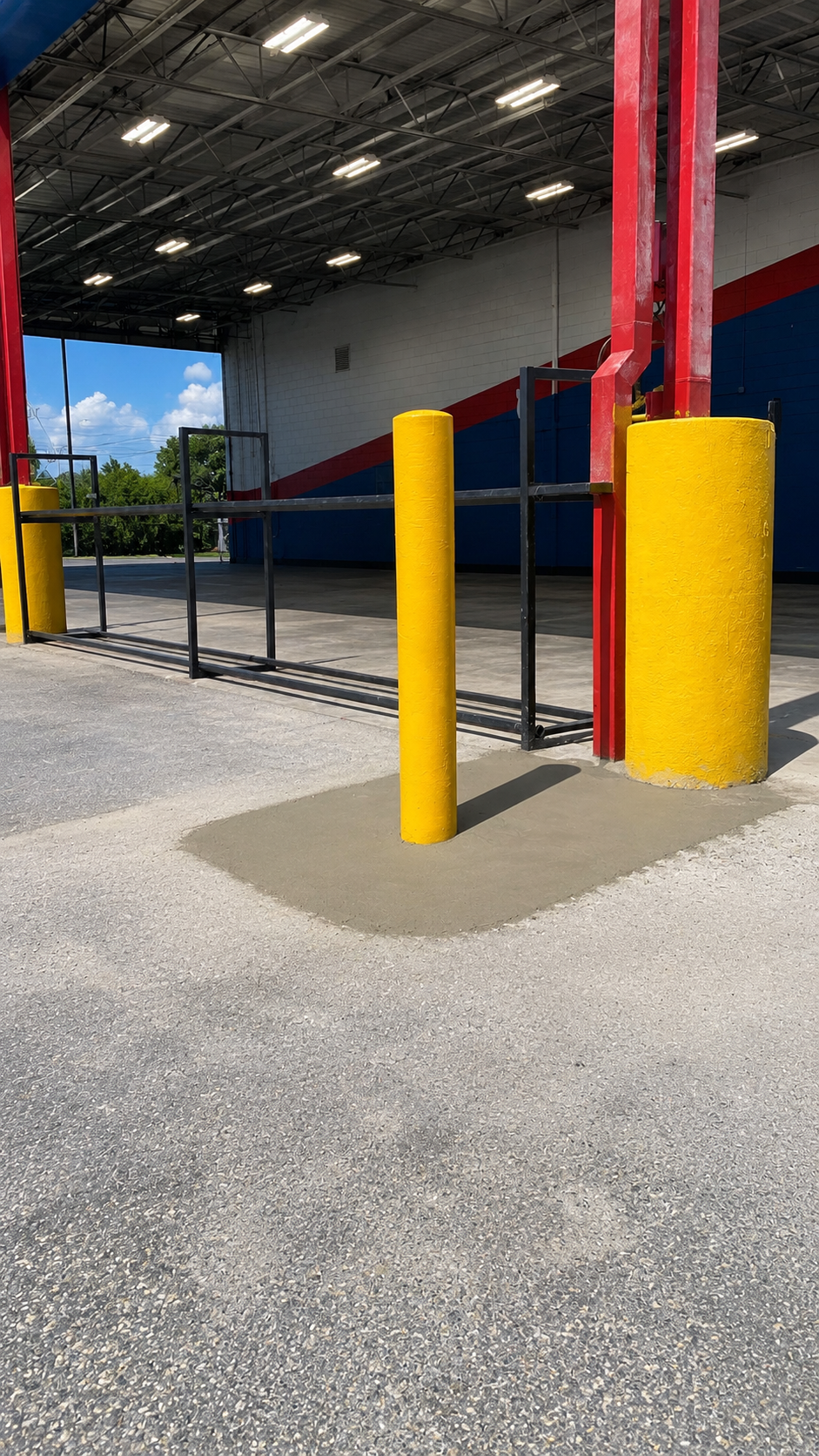 Commercial concrete renovation and remodeling work at warehouse entrance